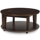  Signature Design by Ashley Korestone 2 T657-8 Round Cocktail Table IMAGE 1